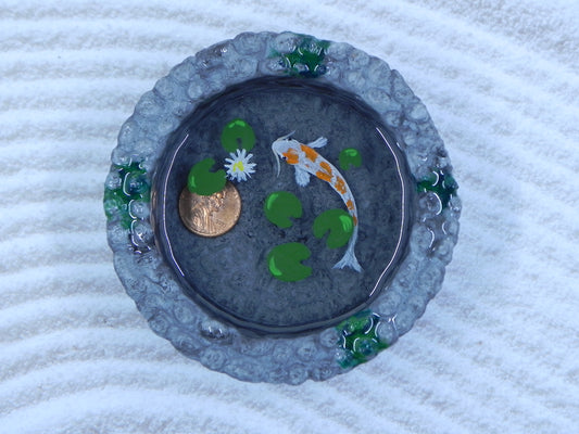 "White with orange spotted koi" wishingwell