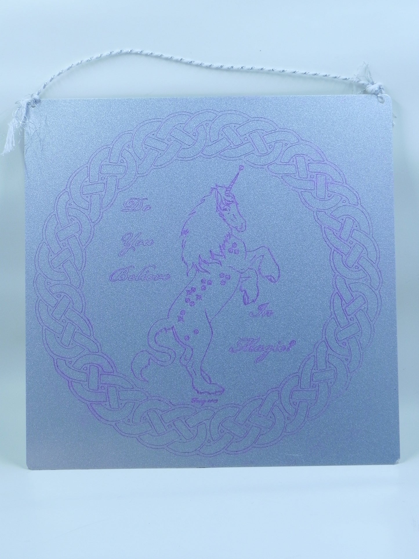 "Do you believe in magic?" metal plaque