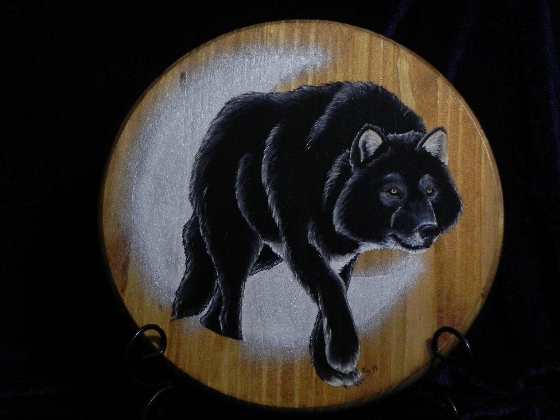 Hand-painted wood plaque with black wolf and moon